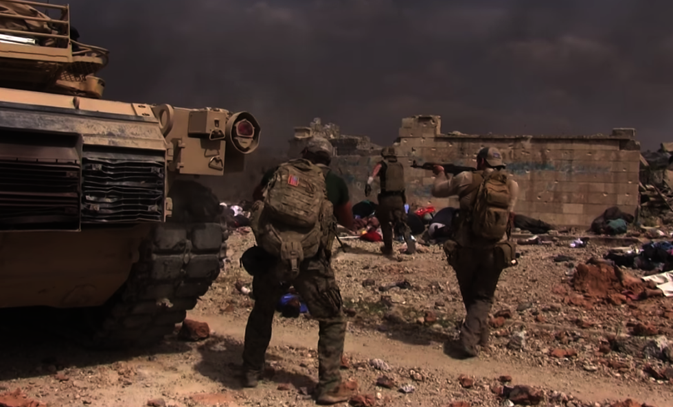 Watch: Christian aid worker braves ISIS gunfire to rescue little girl in Mosul