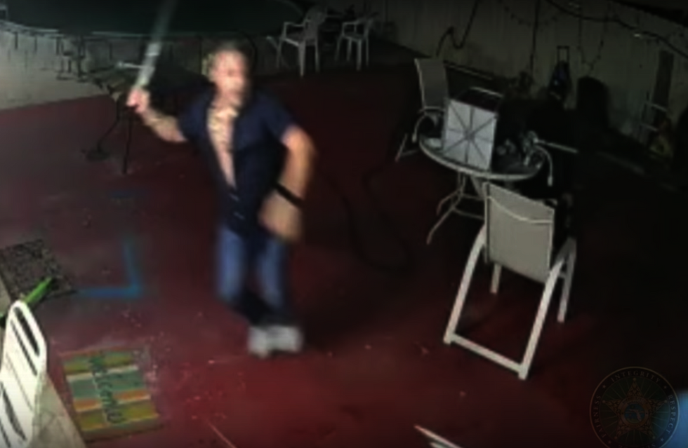 Watch: Florida man chases off gun-wielding home intruders with machete