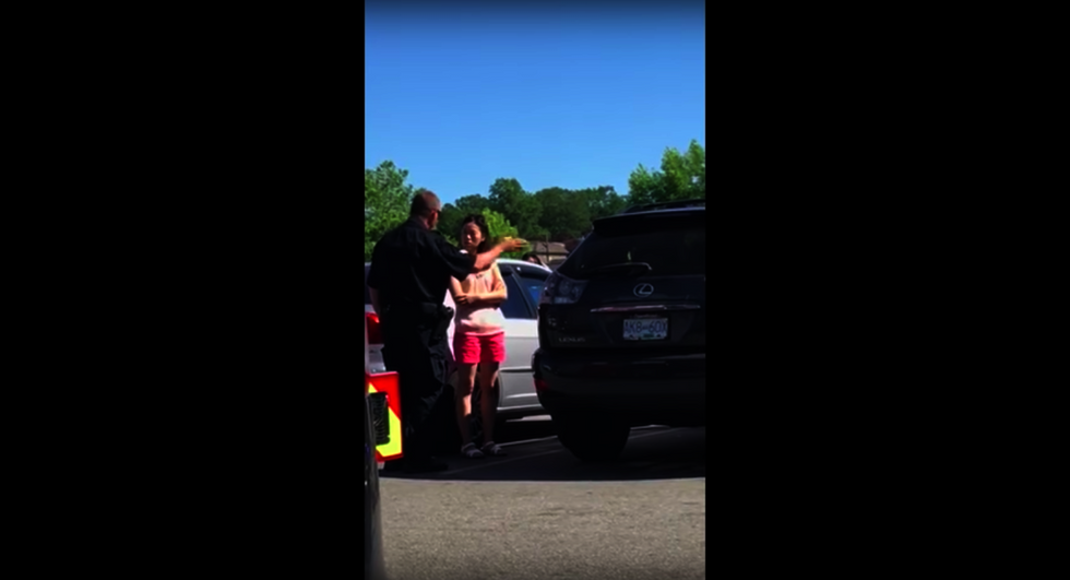 Watch: Police officer confronts mother who left her kids in a hot car
