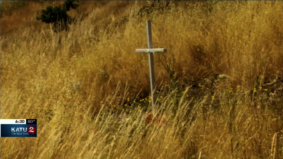 Family removes mother’s roadside cross memorial after atheist group complains