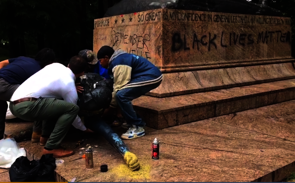 Activists replace statue of Robert E. Lee with statue of a pregnant black woman in Baltimore