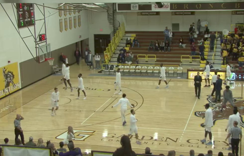 Muslim basketball player who warmed up during anthem is cut, files ACLU complaint