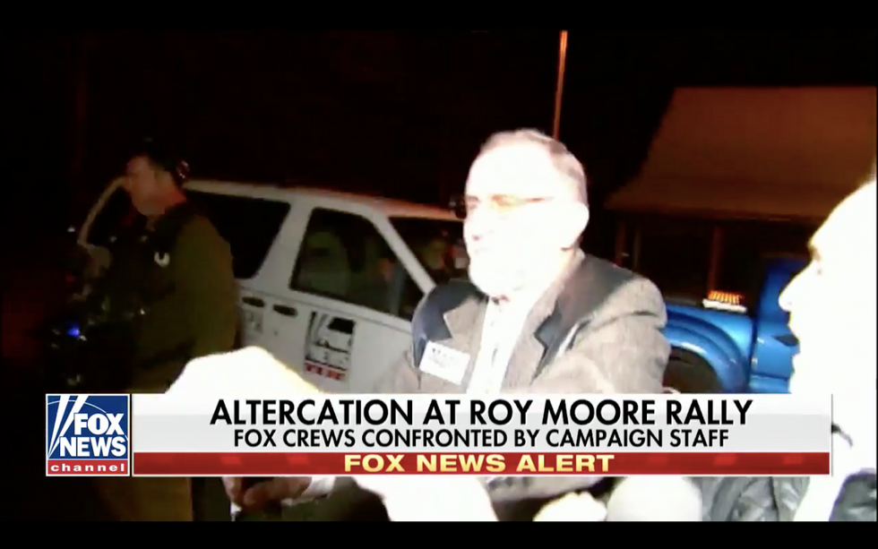 Video shows Roy Moore staffers 'manhandling' Fox News camera crew at a rally