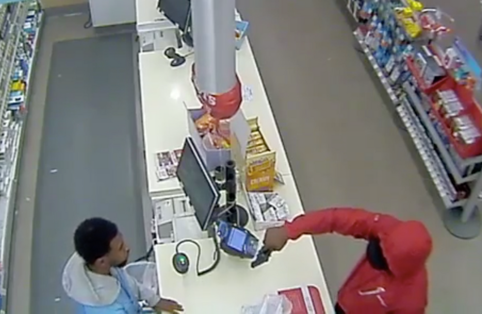 Video shows a Walgreens cashier staring down an armed robber, with a surprising conclusion