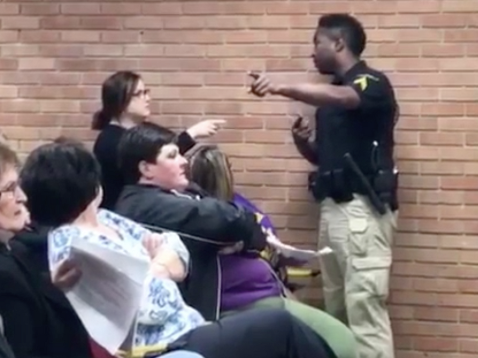 This teacher asked about raises at a school board meeting -- and got arrested for it