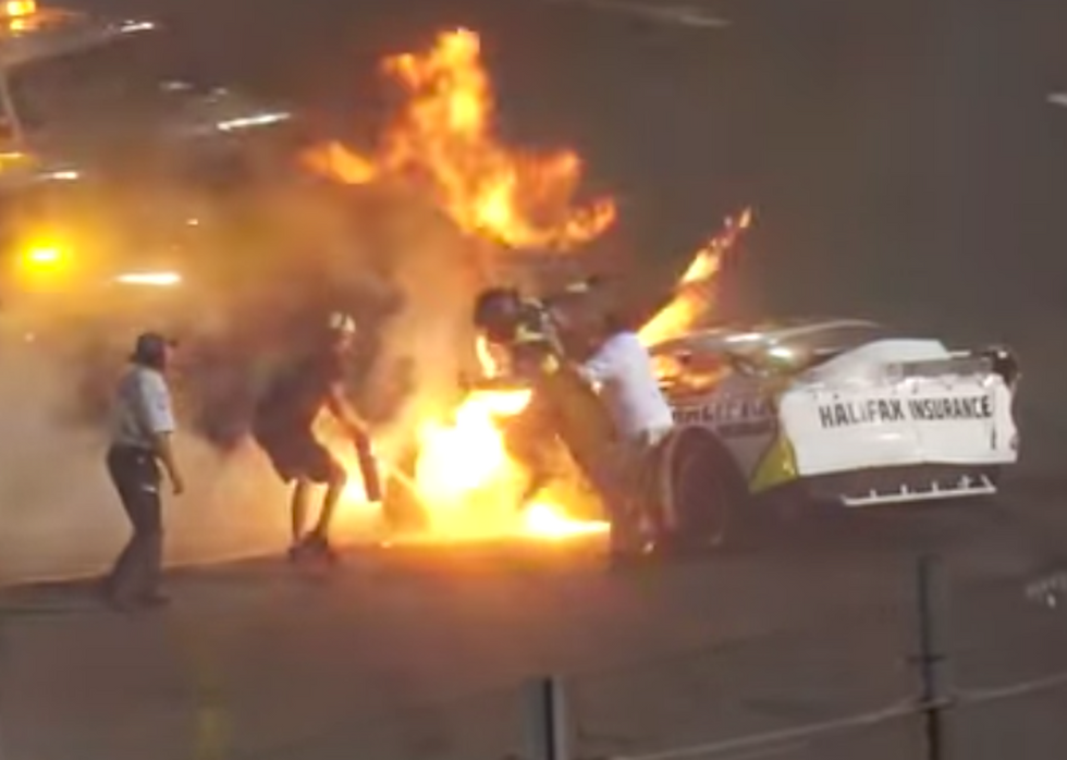 Father runs onto NASCAR track to pull son from burning vehicle — and is punished for it