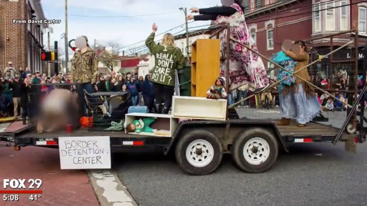 New Year's Day parade sparks outrage with float depicting child in cage at 'border detention center'