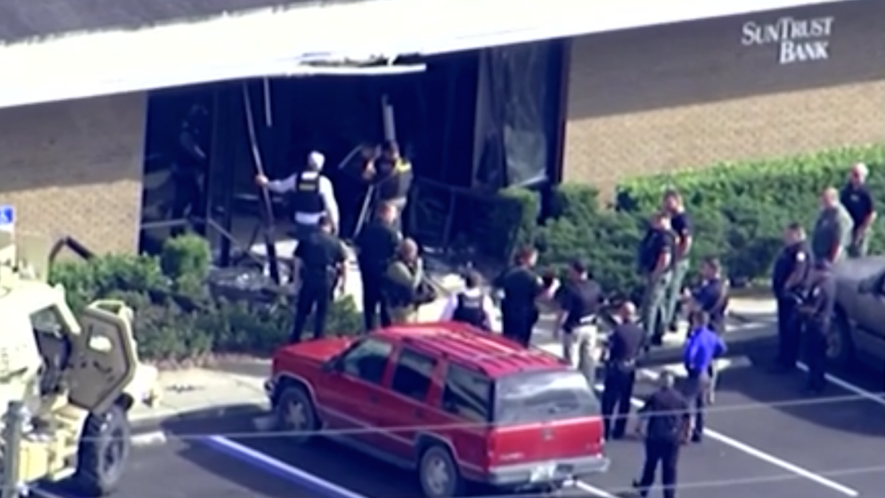 At least five killed by gunman who barricaded himself inside a Florida bank