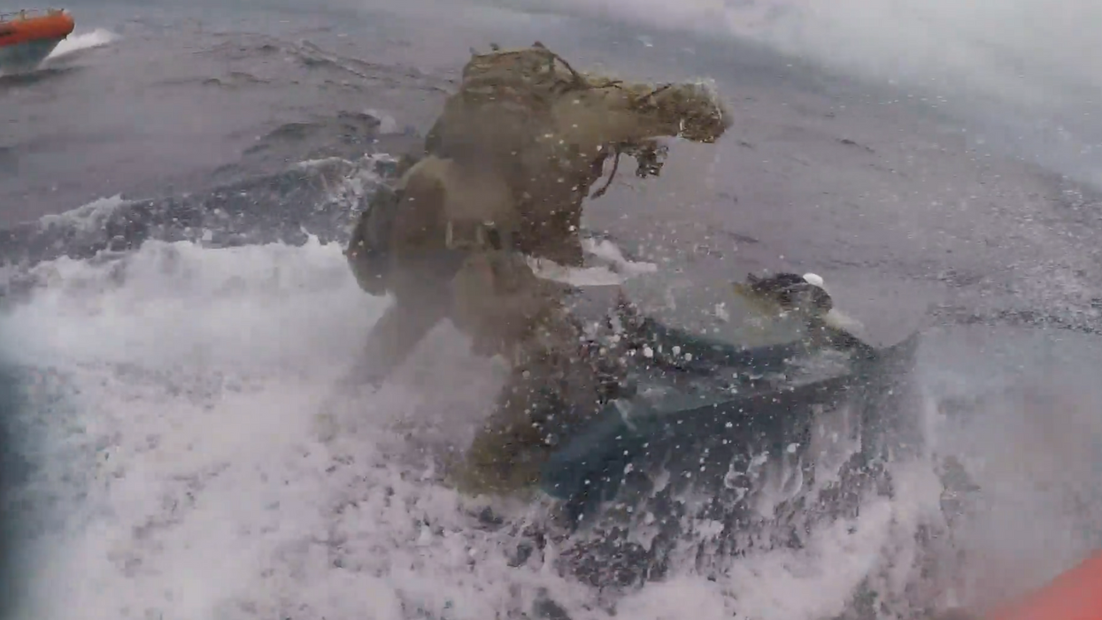 Intense video shows what happens when the US Coast Guard runs down a suspected drug smuggling sub