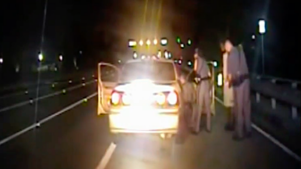 WATCH: Cop pulls over speeding car — then ends up delivering a baby