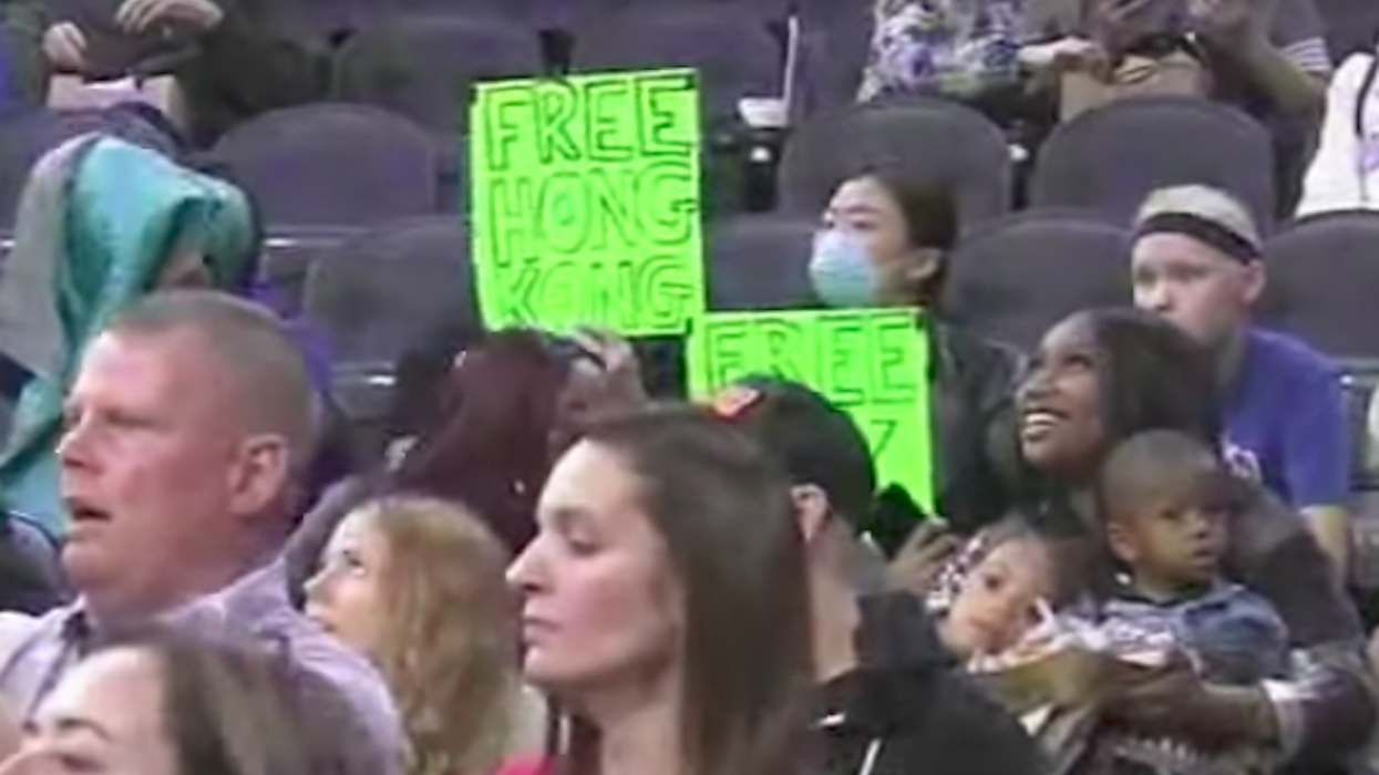 Fans with 'Free Hong Kong' signs kicked out of NBA arena in Philly