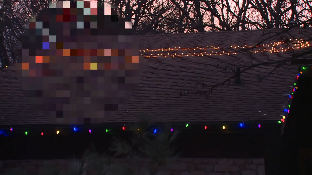 Woman proudly hangs 'a giant glowing d**k' on her roof as a Christmas decoration