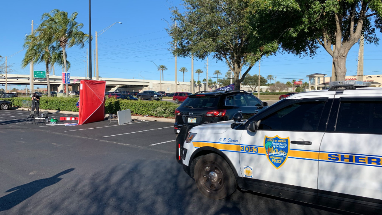 Police say a man intentionally tried to run over Trump volunteers at a GOP voter registration site