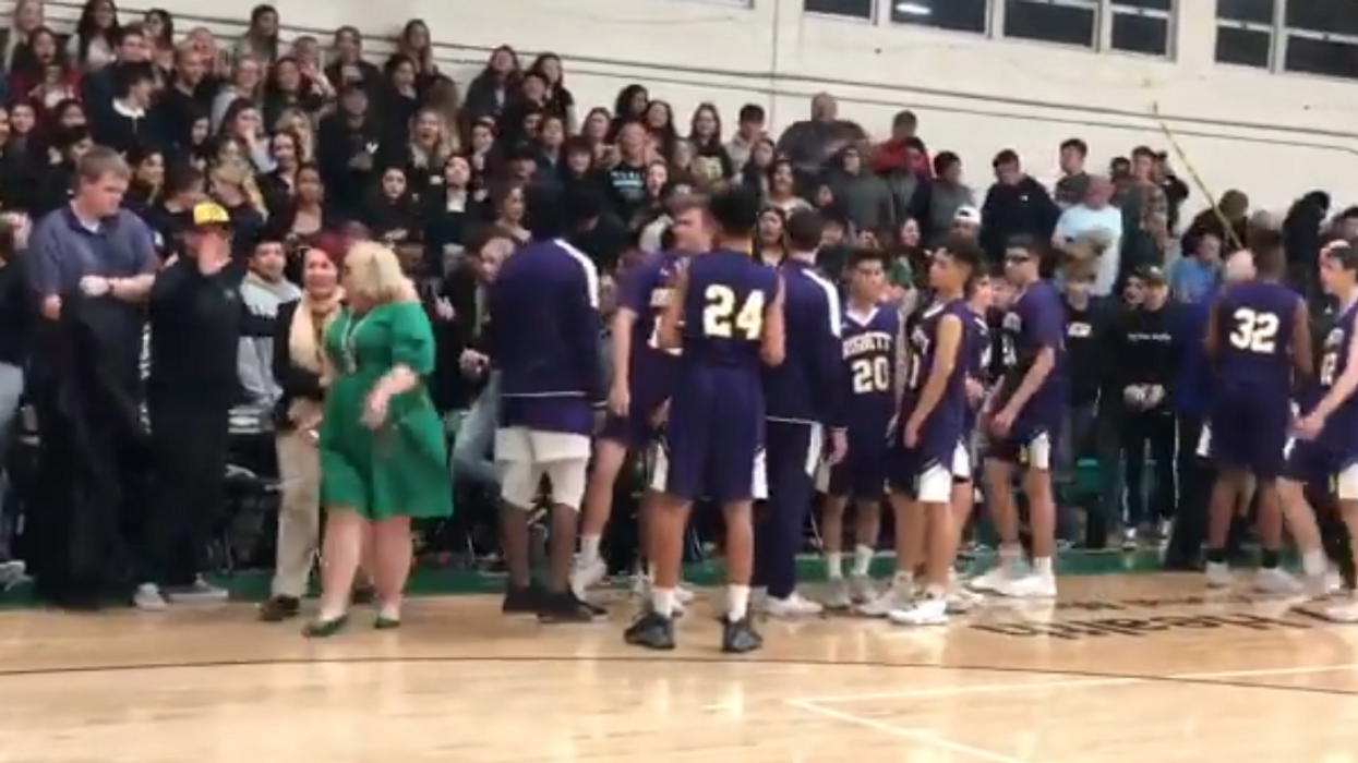 VIDEO: 'Where's your passport?' chant breaks out at a HS basketball game sending the opposing principal charging across the court