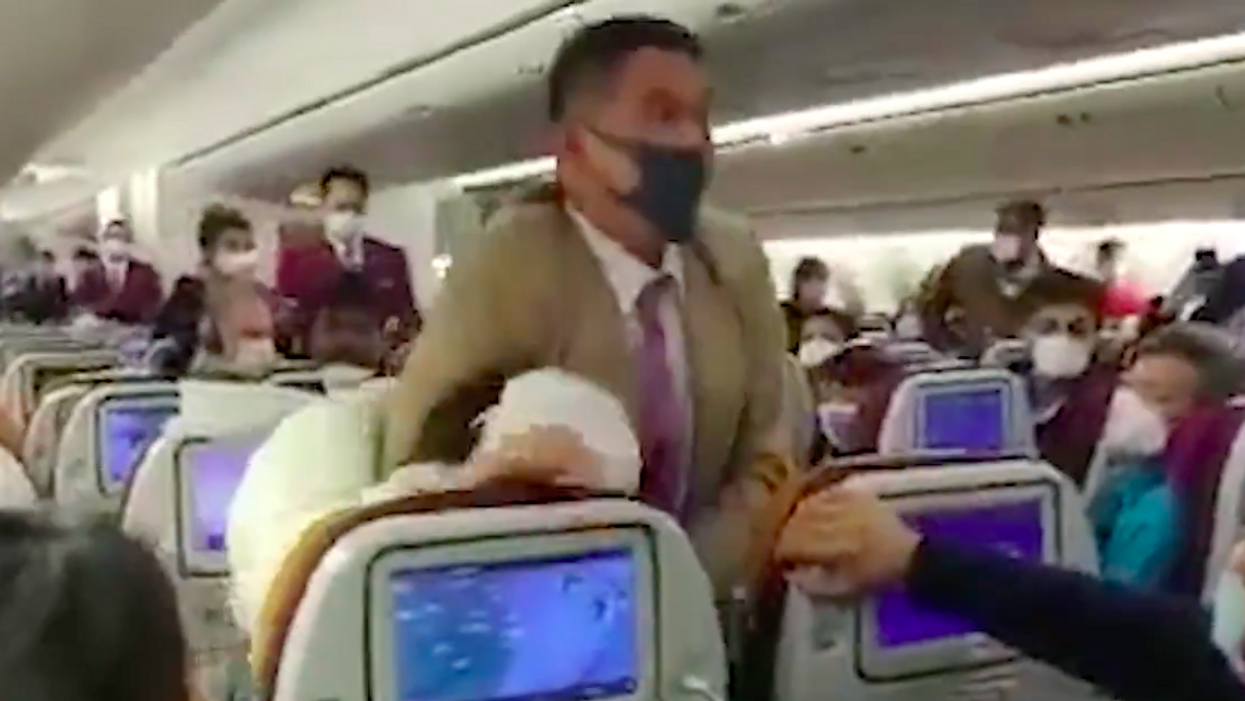 Airline passenger intentionally coughs on flight attendant, gets tackled during coronavirus-related delay