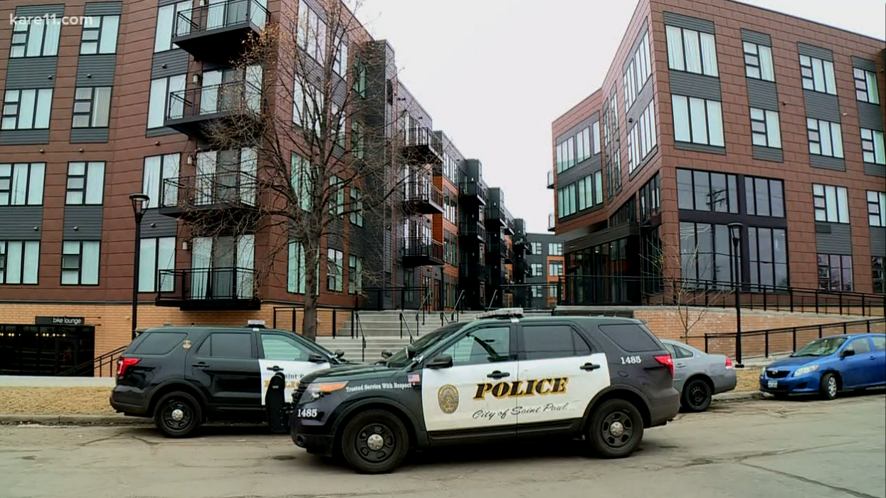 Police say mother went into 11-year-old son’s bedroom, dragged him to the balcony, and threw him off the fourth floor. But she won't say why.