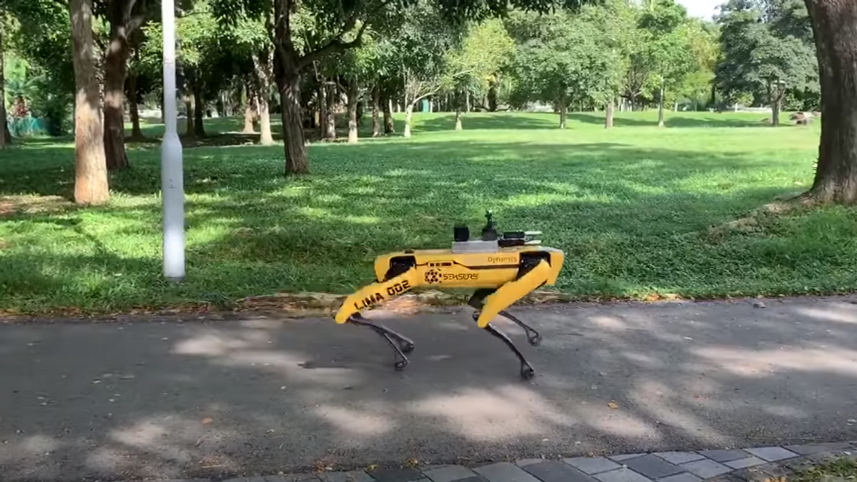 Camera-equipped robot patrols Singapore park telling people to social distance during COVID-19 pandemic