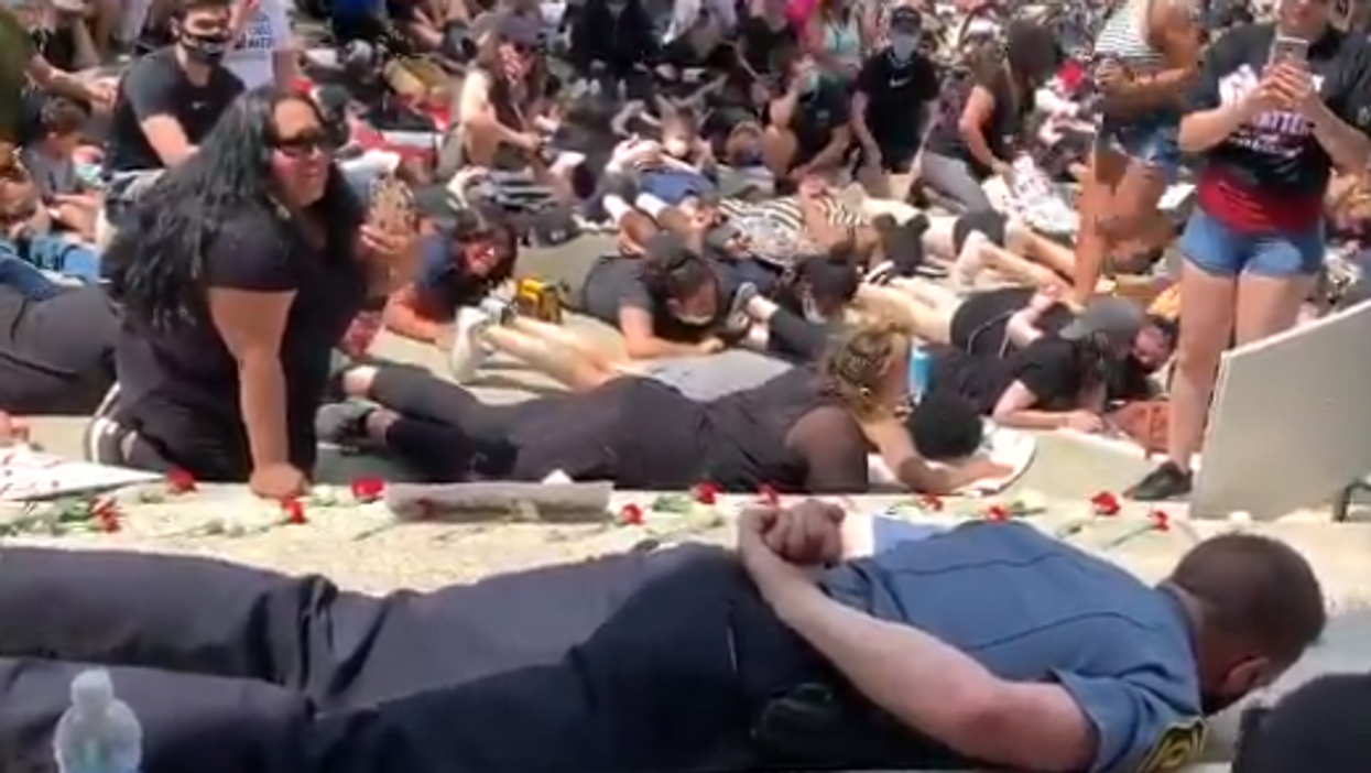 VIDEO: Police chief participates in die-in, lays face down on pavement for eight minutes