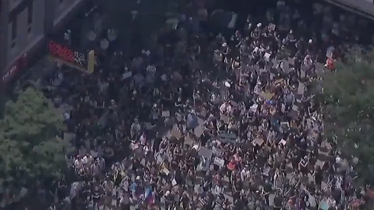 Massive crowds gather in Chicago and NYC for Pride month as global COVID-19 deaths surpass 500,000