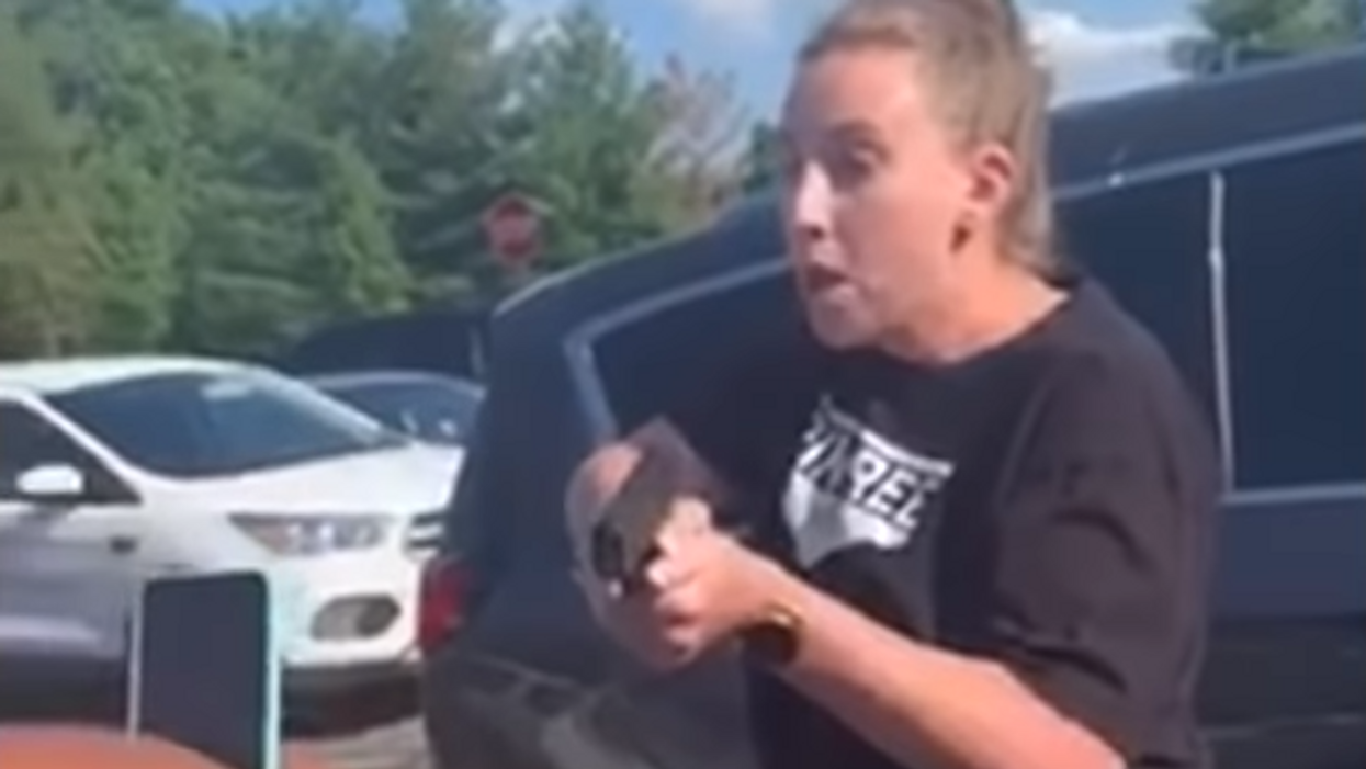White couple charged with felony for pulling gun on black woman
