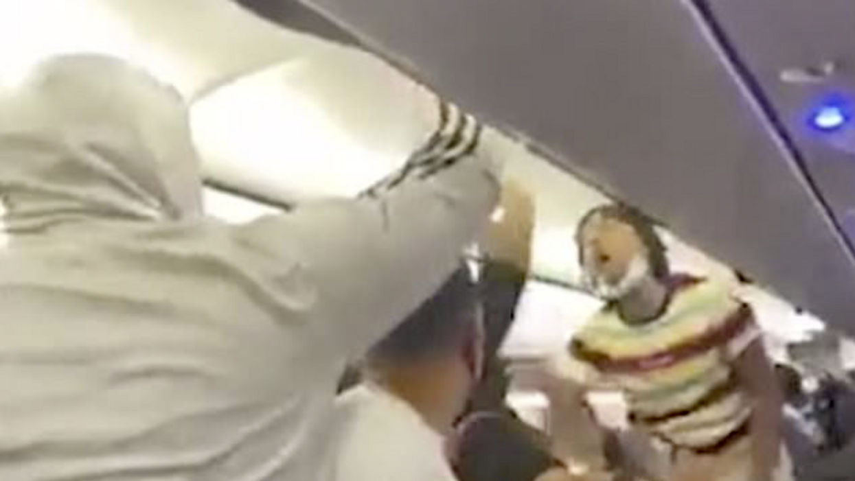 VIDEO: Woman tased on flight during furious brawl over face masks