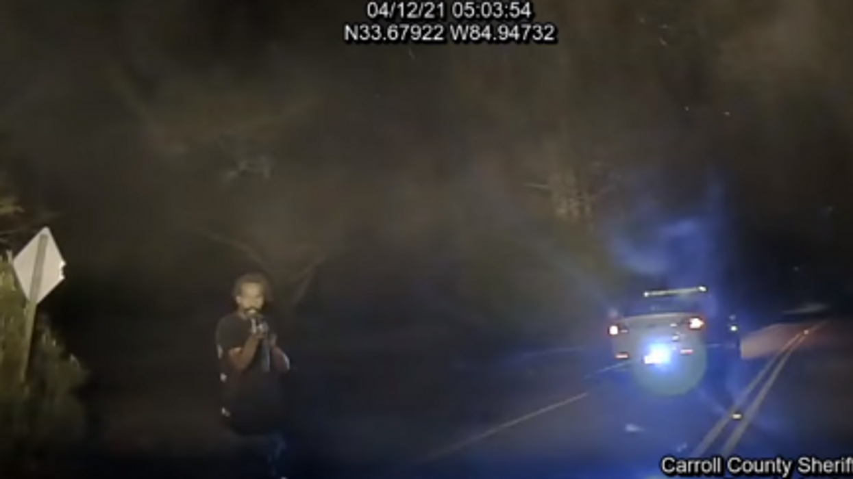 Pulse-pounding dashcam video shows moment police chase suspect opens fire on cops with AK-47