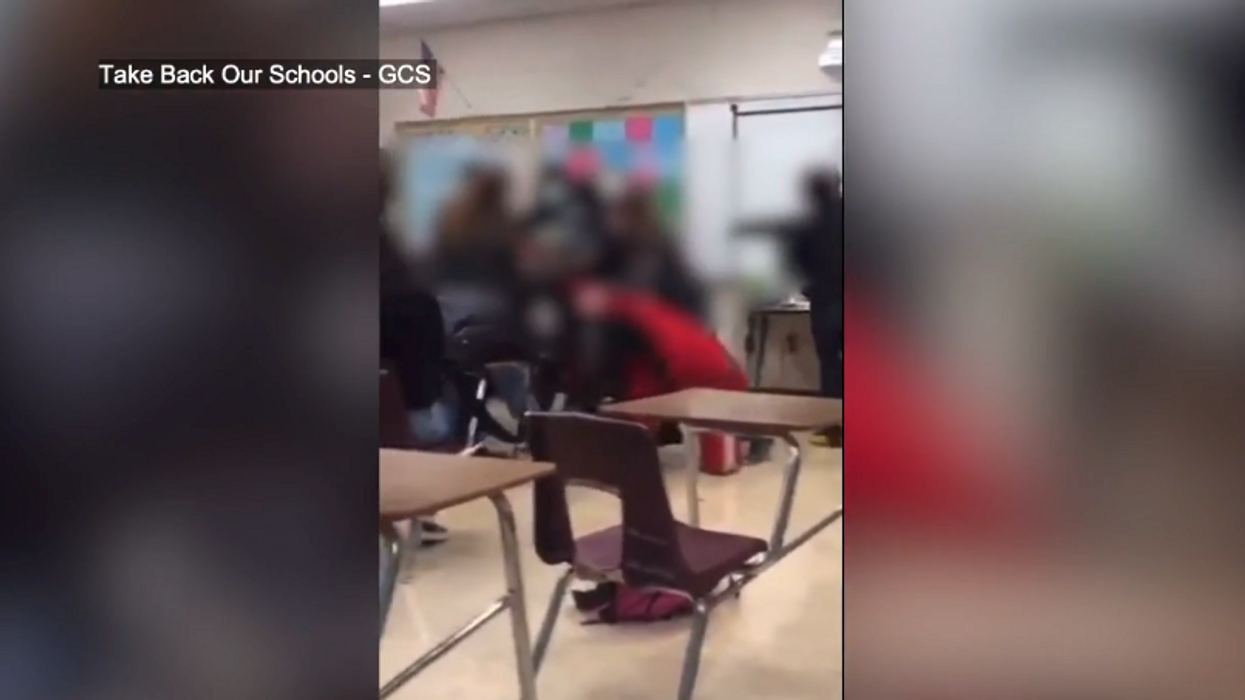Shocking video shows 8 people, including a parent, attacking 14-year-old girl in the middle of class