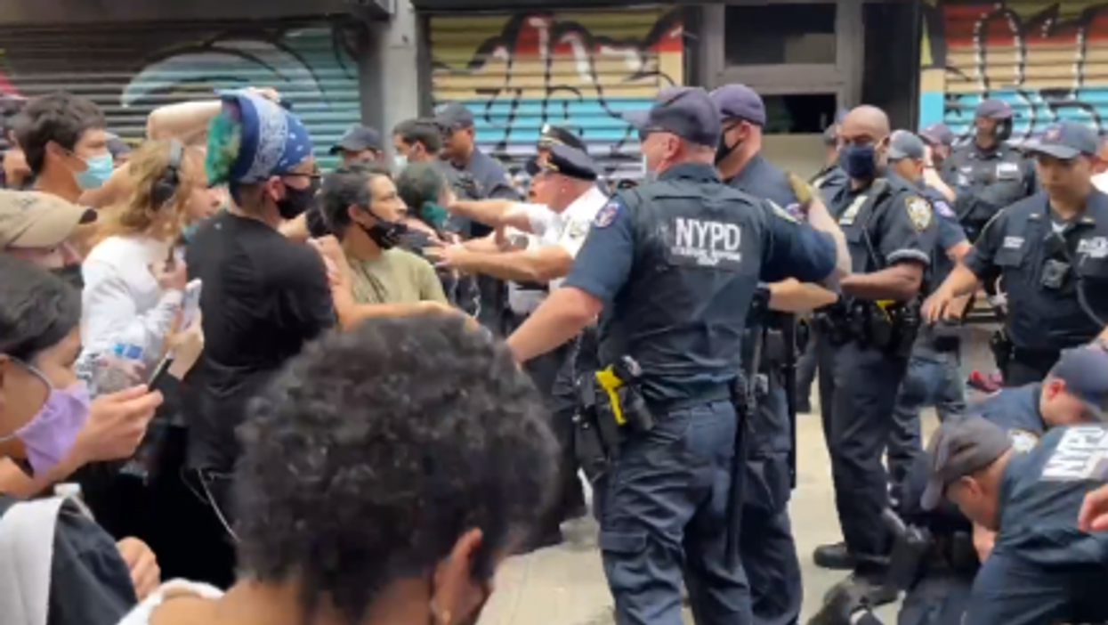 WATCH: Activists occupy vacant NYC store, say black NYPD officer is a 'slave catcher working for KKK,' engage in violent clashes with police