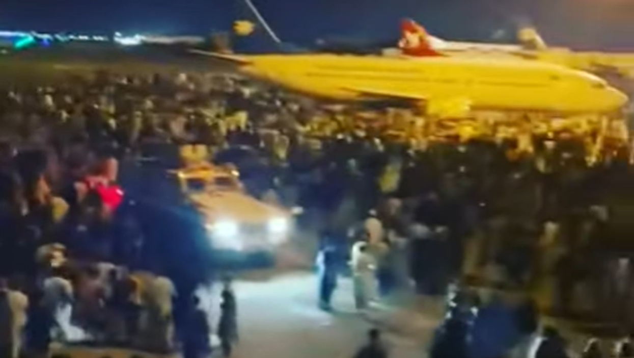 Videos emerge from Kabul: Taliban fighters celebrating inside Afghanistan's presidential palace, complete chaos at the airport