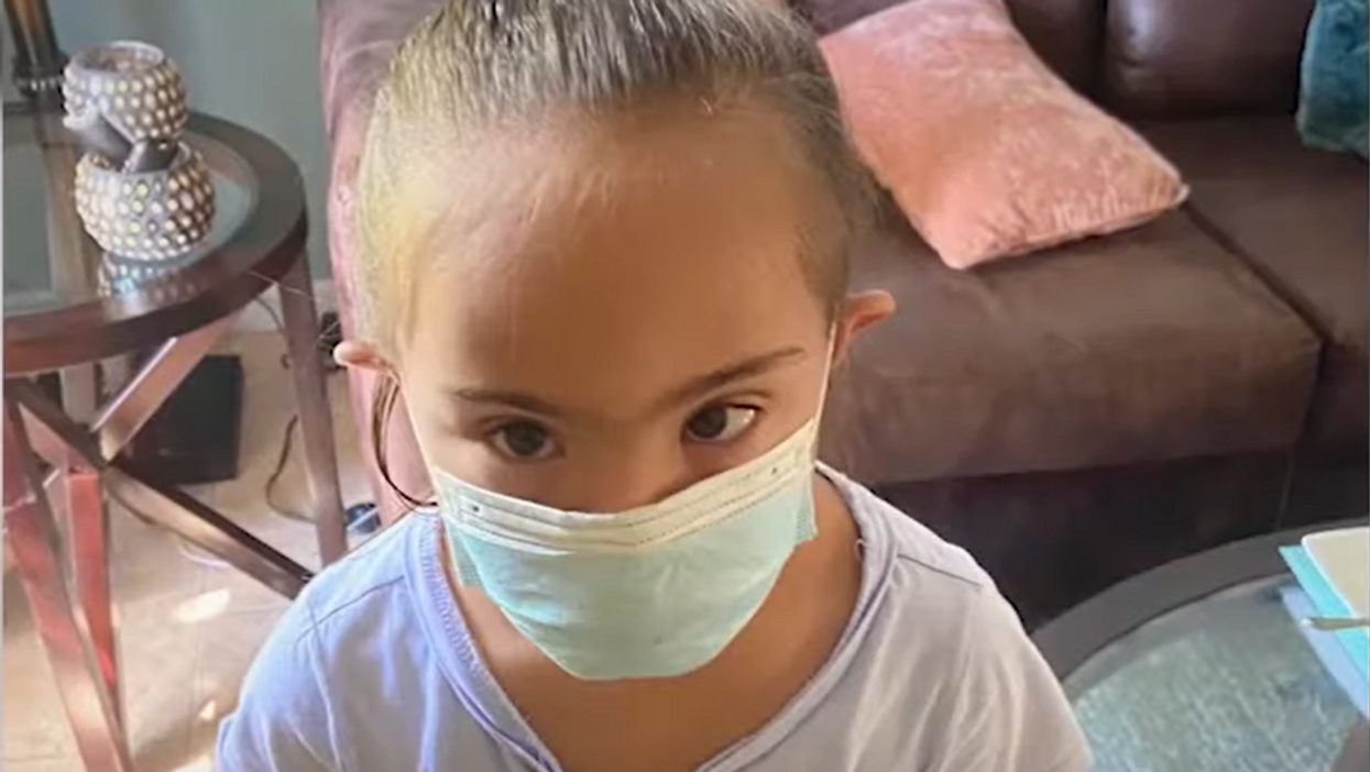 Furious father says school tied mask to head of 7-year-old girl with Down syndrome for weeks; lawmaker declares: 'There's going to be hell to pay'