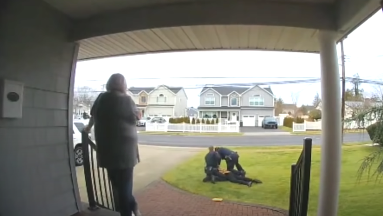 A Long Island grandma tricked a scammer to come to her home where police were waiting to drag him away