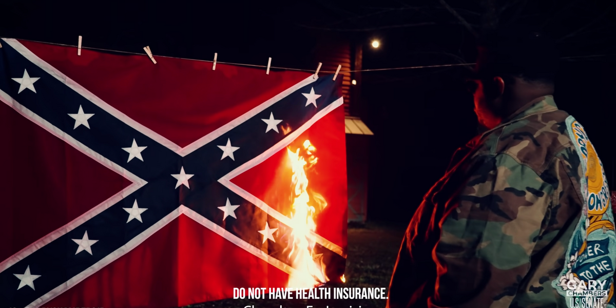 Democrat burns a Confederate flag in campaign ad, claims that 'remnants of the Confederacy remain' throughout the South | Blaze Media