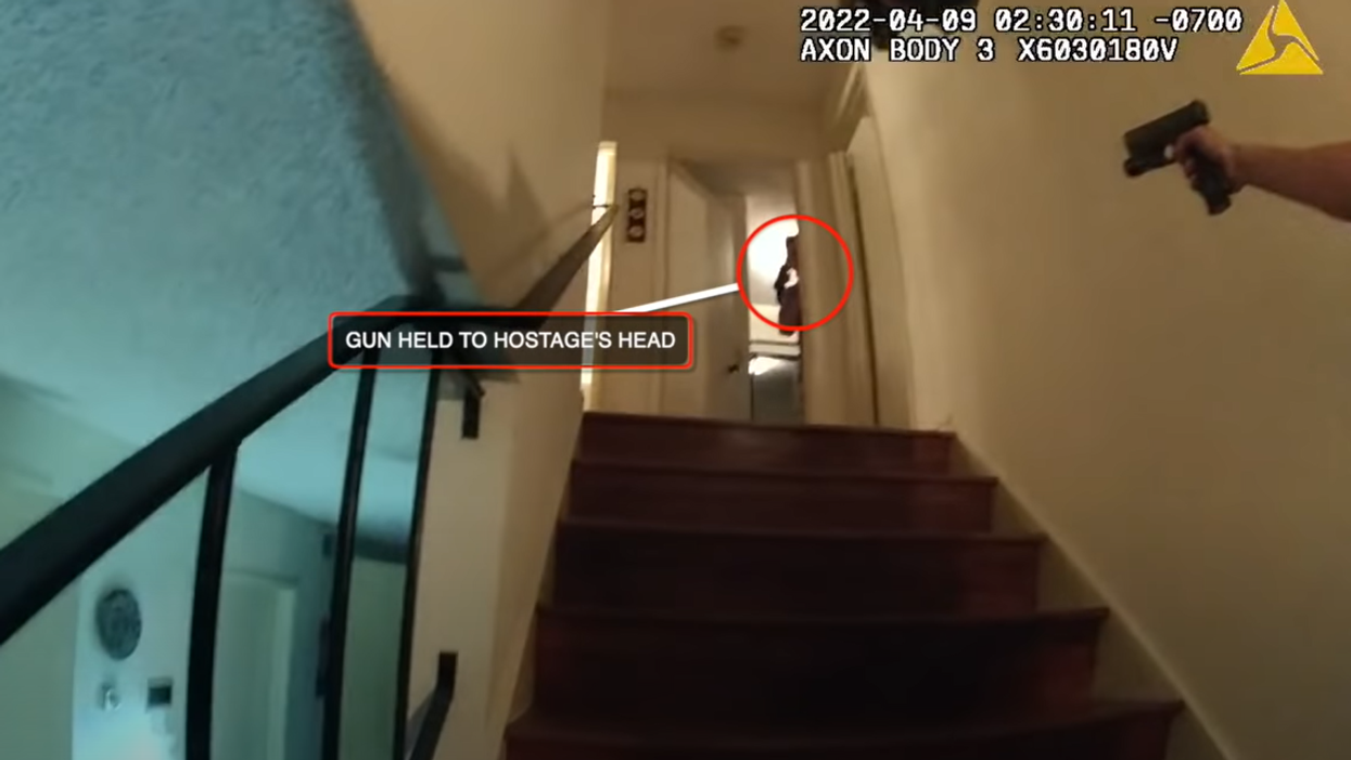 Body cam video shows heart-stopping moment police thwart armed hostage situation by firing on suspect from roof of neighbor's home