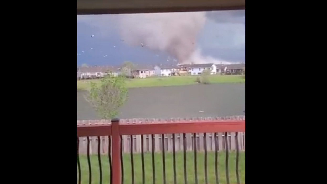 Video captures violent tornado RIPPING a neighborhood apart