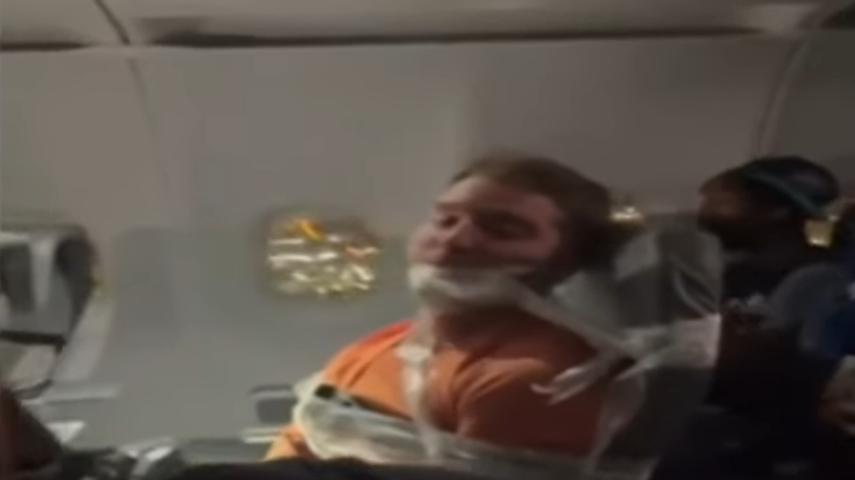 Man seen in viral video taped to seat for allegedly groping breasts of flight attendants sentenced to prison