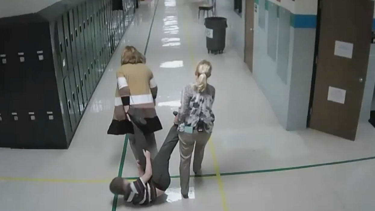 Elementary principal under fire for dragging special needs student through the school by his ankles