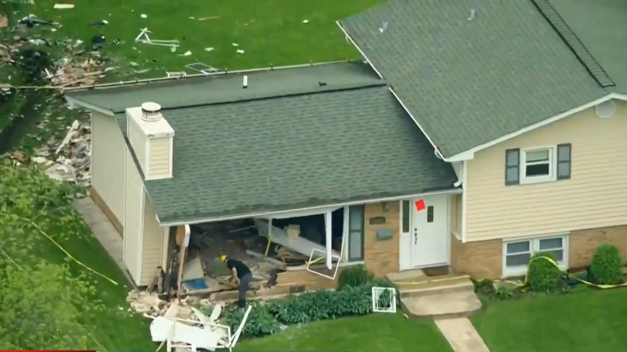 Couple amazingly uninjured after pickup truck crashes right through their house, smashes into tree in their backyard