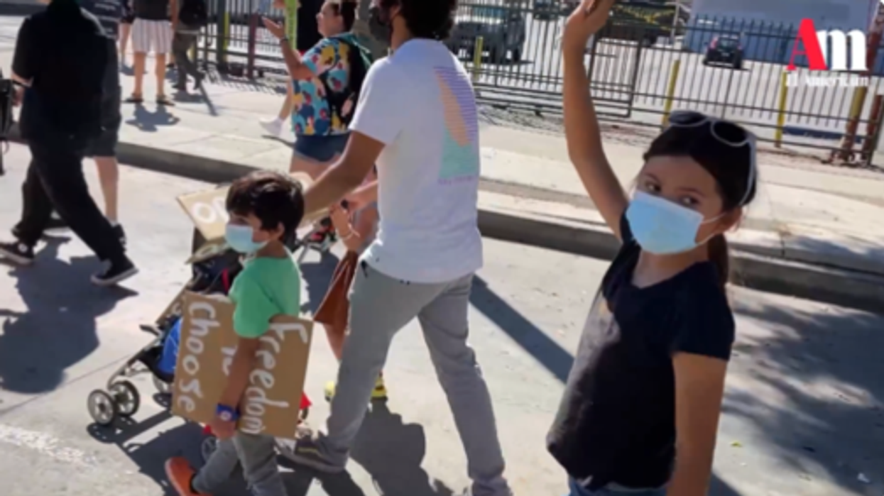 Young kids at pro-abortion rally get rude surprise as cheering NAKED bicyclists join the ranks