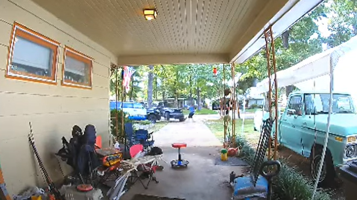 Nail-biting video shows off-duty cop fire gun as he's mowed down by Jeep in his front yard; Alabama man charged with attempted murder