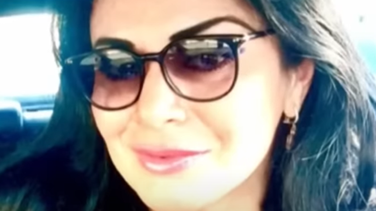 Woman accused of trying to kill doppelganger friend with poisoned cheesecake so she could steal her identity and return to Russia where she is wanted for murder of another woman