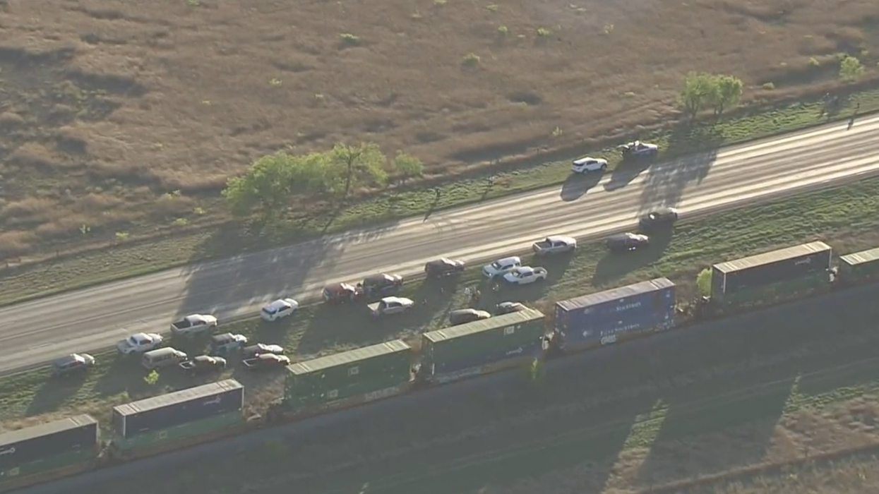 15 migrants found 'suffocating' in 'wired shut' shipping container on a train near Uvalde, Texas; 2 have died