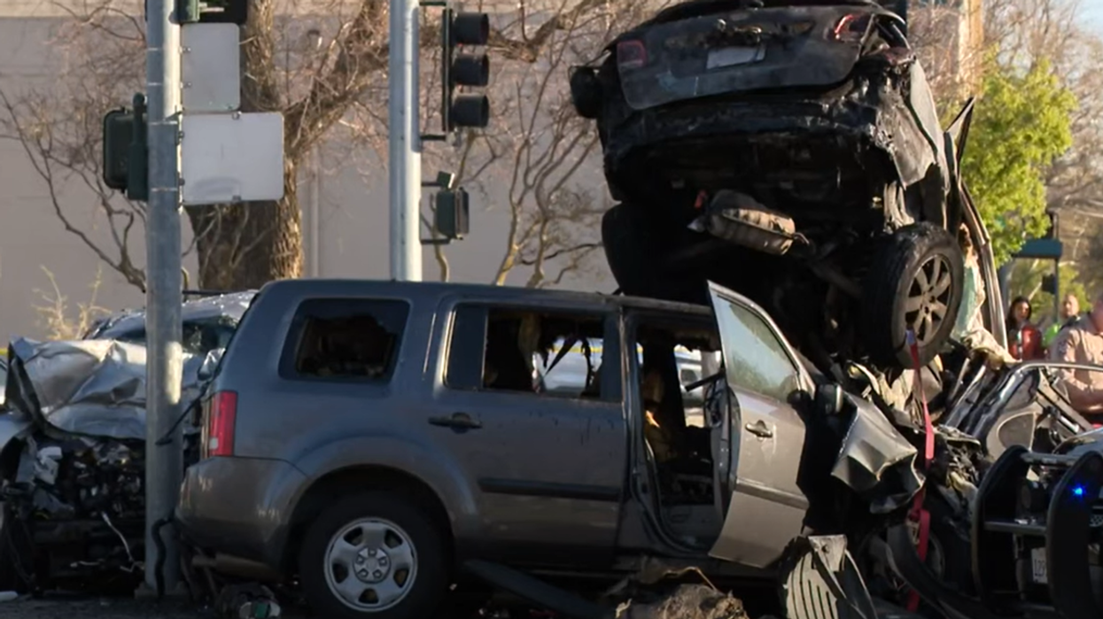 13-year-old leads police on chase in stolen car, causes fiery crash that kills woman and injures 10 others