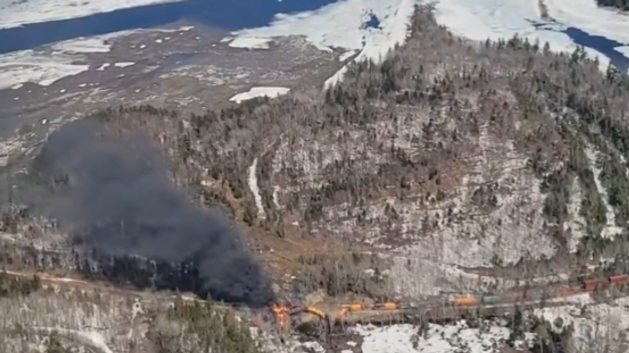 'Stay clear!' Train carrying hazardous materials derails and catches fire in Maine