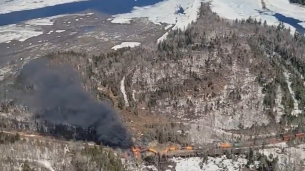 'Stay clear!' Train carrying hazardous materials derails and catches fire in Maine