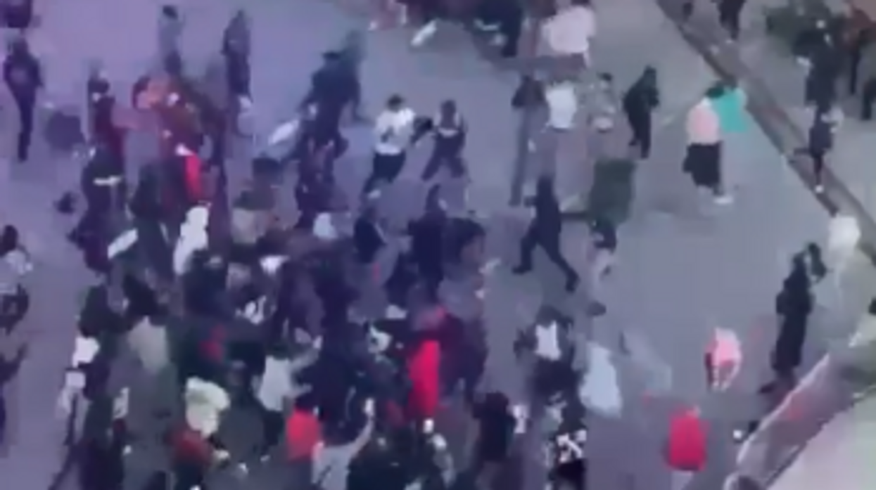 Chicago suburb forced to cancel armed forces carnival after flash mob of 400 teens causes chaos, video shows brawls and kids clashing with cops