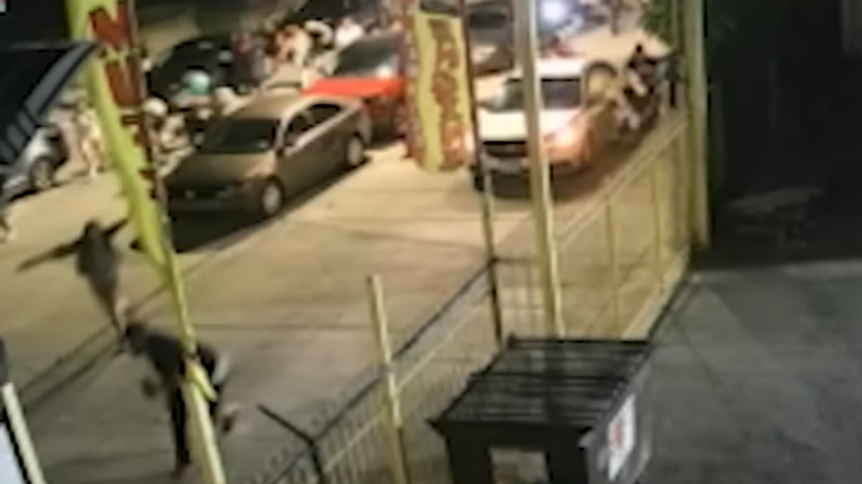 Chicago shootings: 50 people shot, 10 fatally this weekend. New video shows criminals armed with makeshift machine guns open fire on crowd, killing 14 year old.