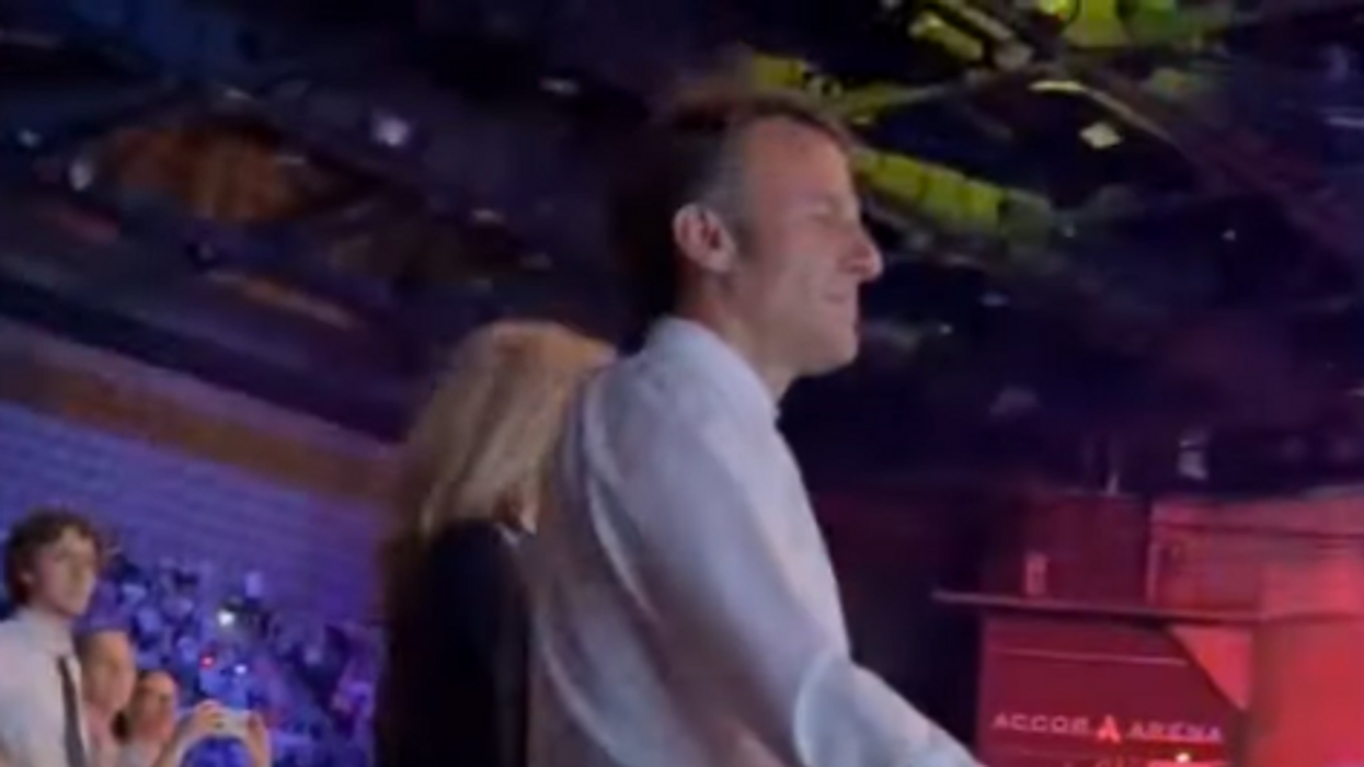 Emmanuel Macron caught on video dancing at Elton John concert as fiery riots ravaged France