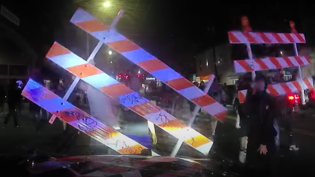 Video shows Seattle police retreat from unruly mob that stopped cops from breaking up illegal street-racing gathering where 4 people were shot