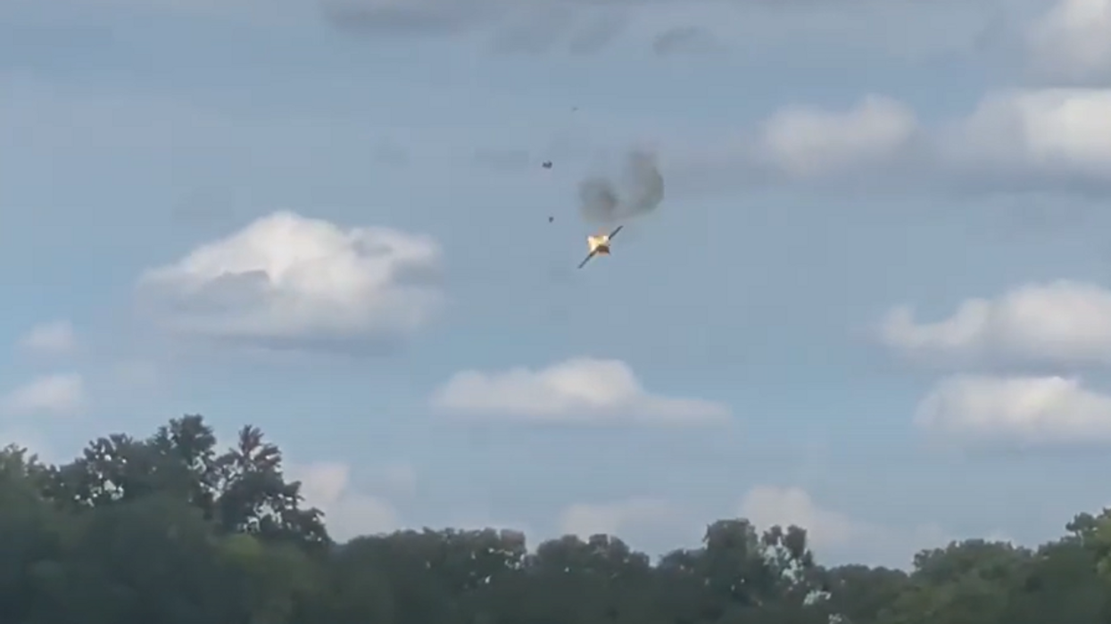 Video: Fighter jet crashes near apartment building complex during air show in Michigan