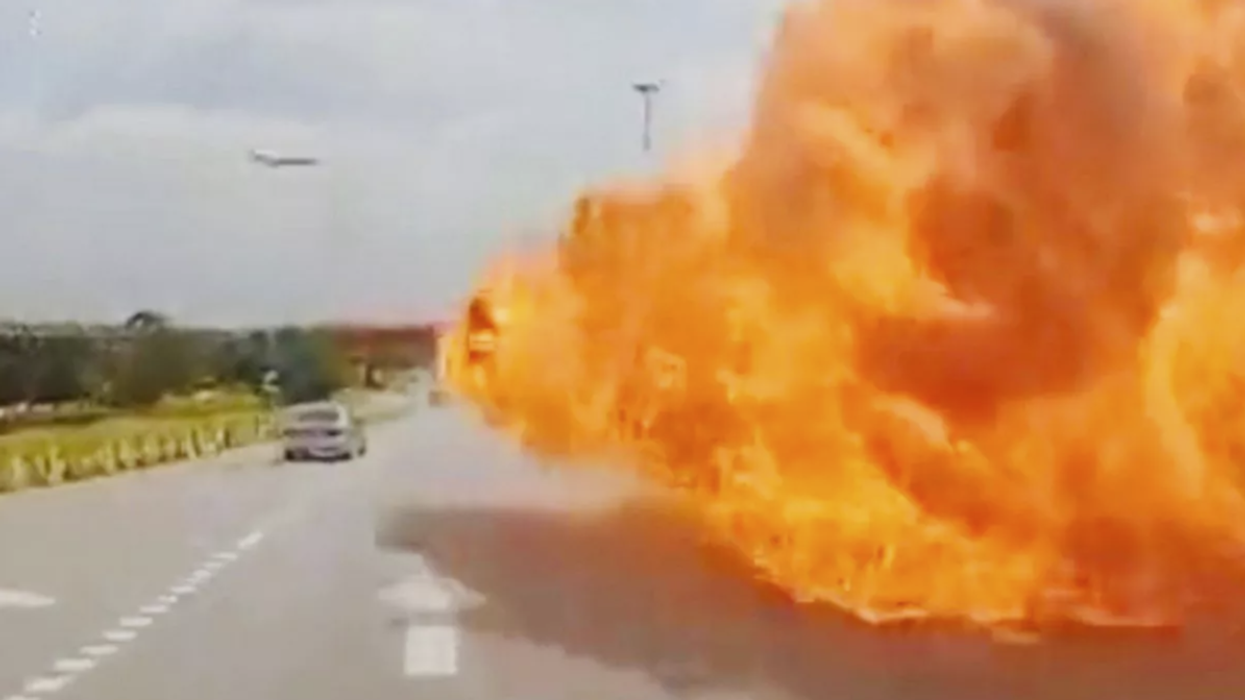 Terrifying video shows jet plane crash into traffic on expressway in Malaysia